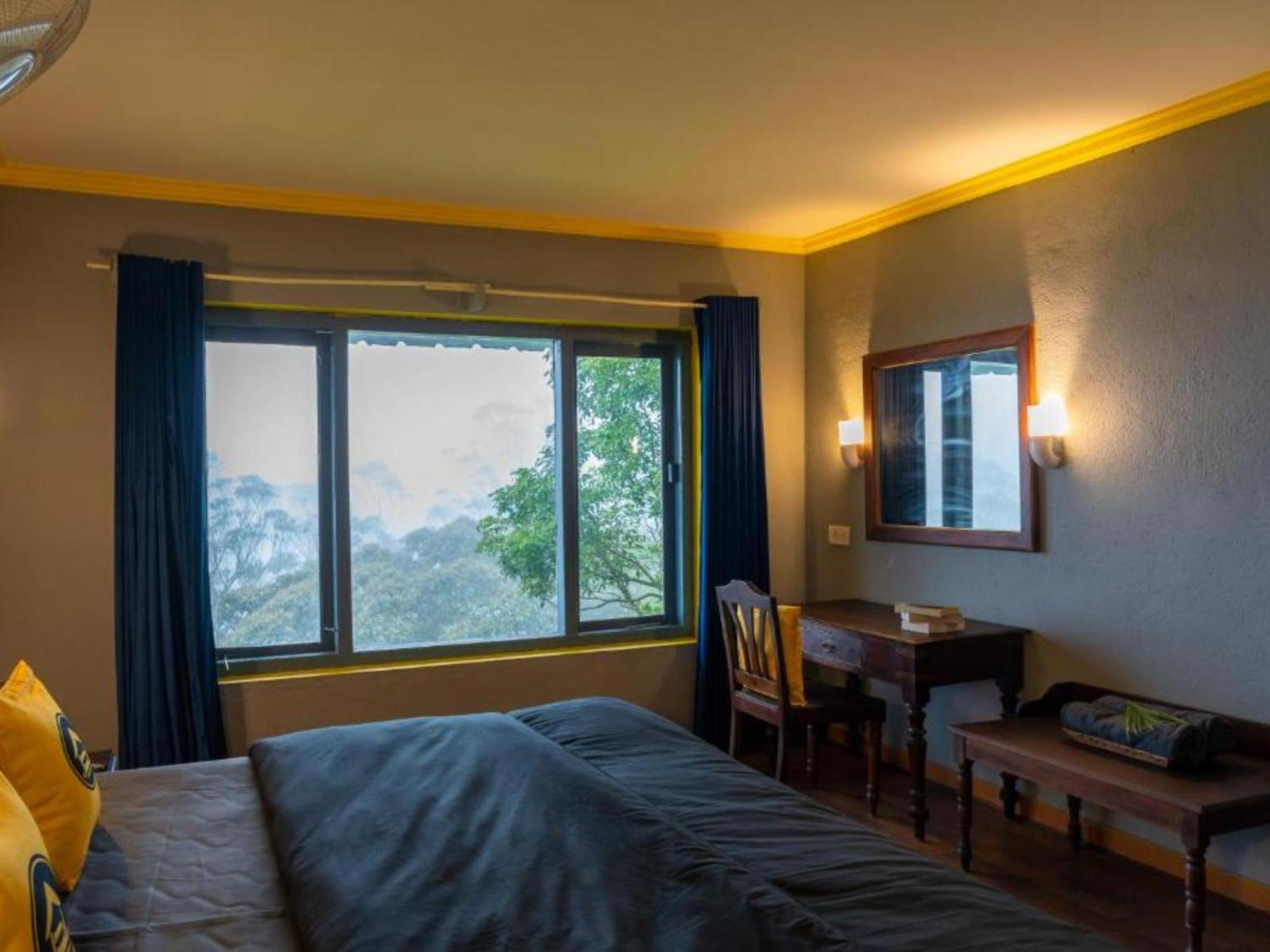 The Hosteller Муннар Номер фото